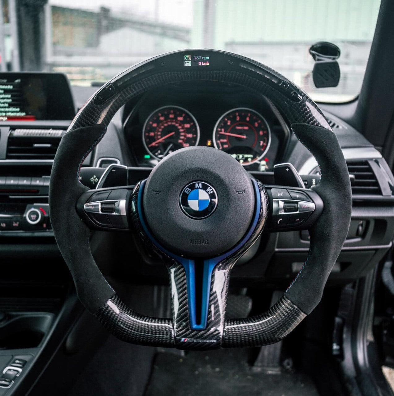 Elevate Your Driving Experience with a Custom Carbon Fiber Steering Wheel